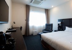 침실 4 Sakura Hotel 1