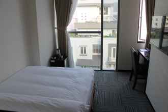 Bedroom 4 Sakura Hotel 2	