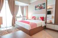 Bedroom OYO Flagship 755 Appartel Grand Dhika City