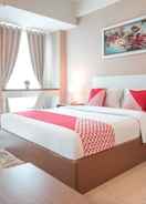 BEDROOM OYO Flagship 755 Appartel Grand Dhika City