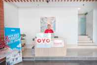 Lobi OYO Flagship 755 Appartel Grand Dhika City