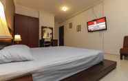 Kamar Tidur 3 Orchard Suite Guesthouse