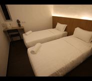 Bedroom 3 Place2Stay Business Hotel @ Metrocity