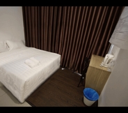 Bedroom 6 Place2Stay Business Hotel @ Metrocity