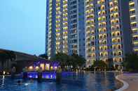 Swimming Pool Studio Room at Cosmy Orchard Apartment