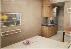 ห้องนอน 5 Studio Room at Cosmy Orchard Apartment