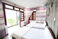 ห้องนอน Cao Lam Hotel