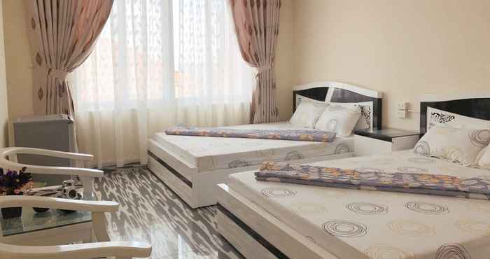 Kamar Tidur Babycat Hotel & Café