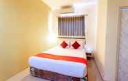 Bedroom 4 Pratisarawirya Guesthouse by ecommerceloka