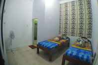 Kamar Tidur Adikarta Guesthouse Amalia Syariah