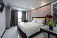 ห้องนอน Capital O 3433 Hotel Plaza