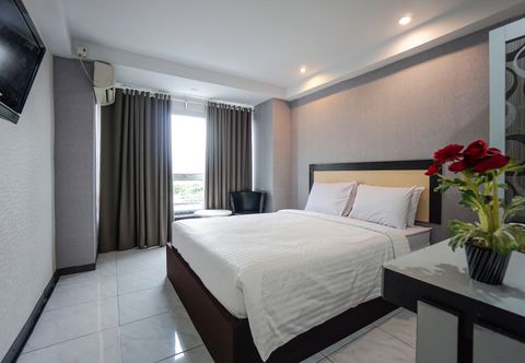 Kamar Tidur Capital O 3433 Hotel Plaza