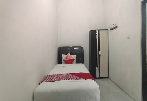 ห้องนอน OYO 90157 Griya Andon Syariah