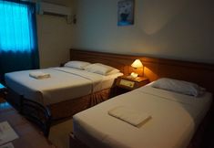 ห้องนอน 4 Holiday Karimun Hotel