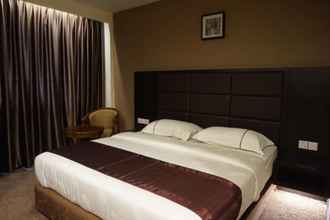 Kamar Tidur 4 Holiday Karimun Hotel