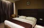 Kamar Tidur 3 Holiday Karimun Hotel