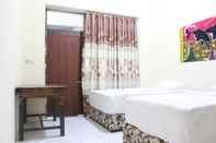 ห้องนอน Homy Inn Near Simpang Lima Semarang