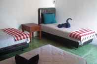 Kamar Tidur Izaac's Bed & Breakfast