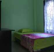 Kamar Tidur 5 SanZos Stay Samosir