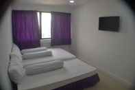 Kamar Tidur City Room w/ 2 Beds @ Town 4