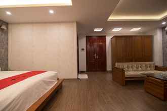 Kamar Tidur 4 Queen's Hotel