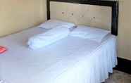 Kamar Tidur 6 Lia Guest House Syariah