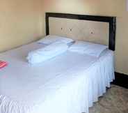 Bedroom 6 Lia Guest House Syariah