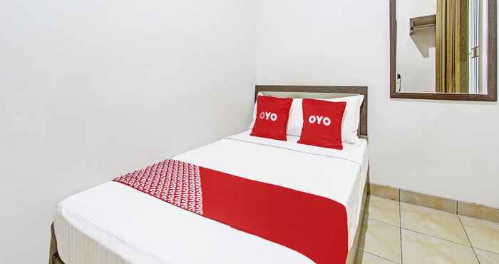 Bedroom OYO 91975 Nadika Guest House Syariah