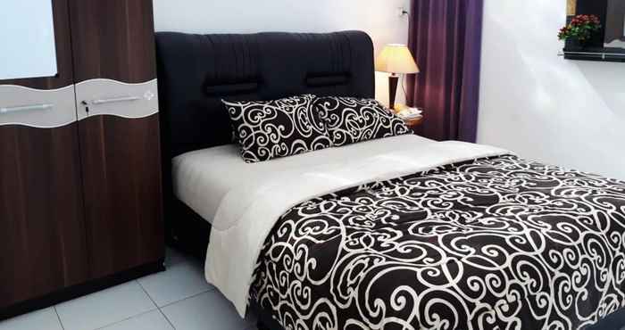 Bilik Tidur Simple Room at Mocca Syariah House