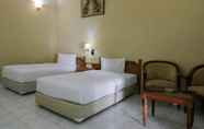 Kamar Tidur 5 Gitrary Hotel