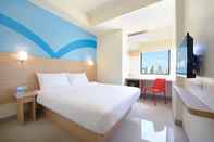 Bedroom Hop Inn Hotel Aseana City