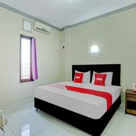 Bedroom 1 OYO 90520 Kuta Family Guest House, Domestic Arrival Gate - Ngurah Rai International Airport (DPS) Hotels