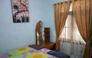 Bedroom 3 Taman Puri Siarma Homestay by Desa Wisata Blimbingsari