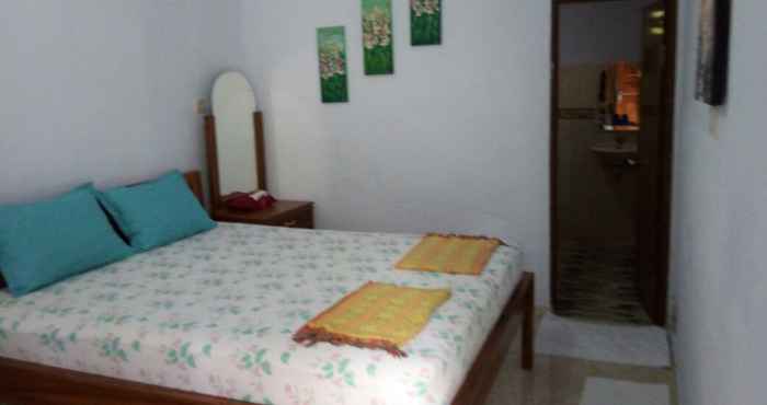 Bedroom Taman Puri Siarma Homestay by Desa Wisata Blimbingsari