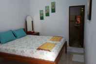 Bedroom Taman Puri Siarma Homestay by Desa Wisata Blimbingsari