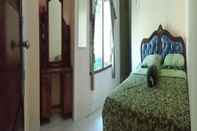 Bedroom Shallom Homestay by Desa Wisata Blimbingsari