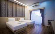 Kamar Tidur 4 The SG Hotel