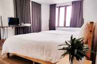 Kamar Tidur Kool House Hotel