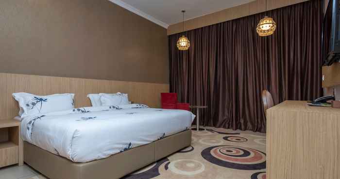Bedroom Hotel Holmes GP by Holmes Hotel