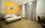 Kamar Tidur 7 Green Rose Hotel