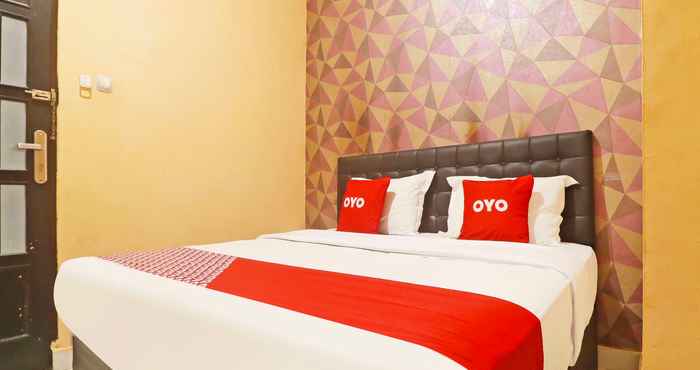 Kamar Tidur OYO 90492 Papi Inn Guesthouse