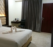 Bedroom 6 Sindoro Hotel Cilacap by Conary