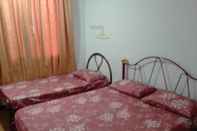 Bedroom Mutiara Kuching Guesthouse