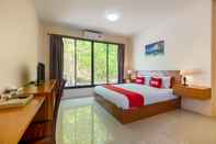 Kamar Tidur OYO 665 Sj House Hotel