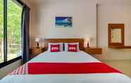 Kamar Tidur 4 OYO 665 Sj House Hotel