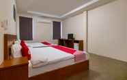 Kamar Tidur 7 OYO 665 Sj House Hotel