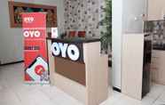 Lobby 5 OYO 703 Omah Olin Guesthouse