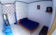 Kamar Tidur 6 Bira Youzard Guest House