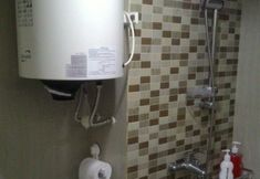 In-room Bathroom 6 Jarrdin Apartment Cihampelas by Indra