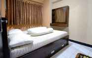 ห้องนอน 4 Apartemen Sentra Timur by Welcome Property